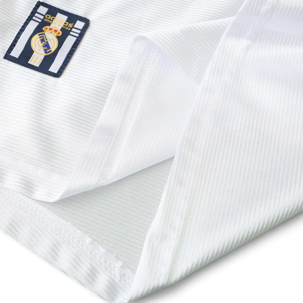 Elite Retro Kits Real Madrid 1999/00 home shirt featuring white textured fabric and adidas official replica patch