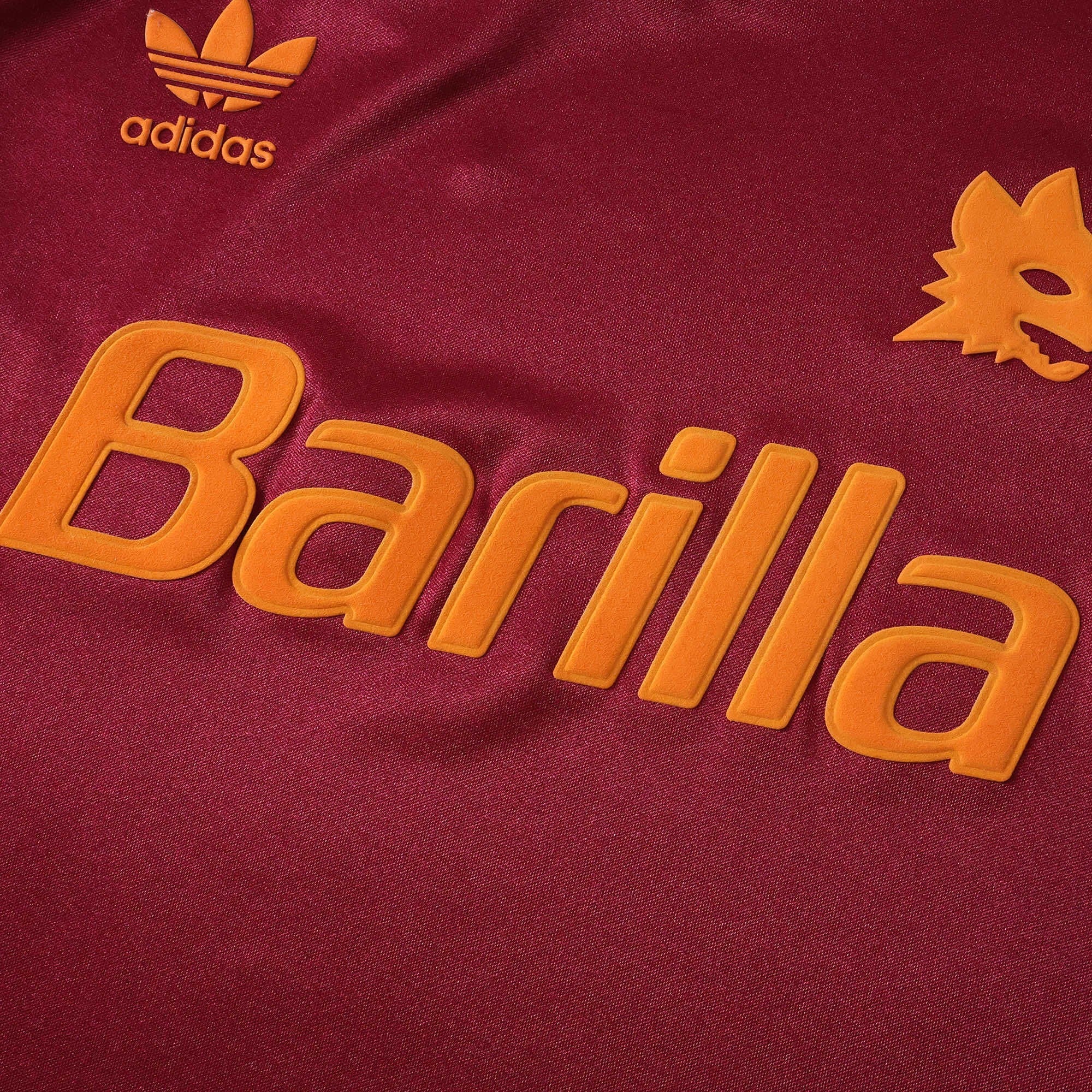 Elite Retro Kits Roma 1992-94 home shirt in deep red with yellow Barilla sponsor, wolf crest, and adidas logo.
