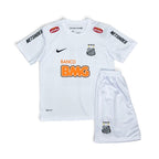 Elite Retro Kits Santos 2012/13 kids home kit featuring a white jersey with sponsor logos and matching white shorts.