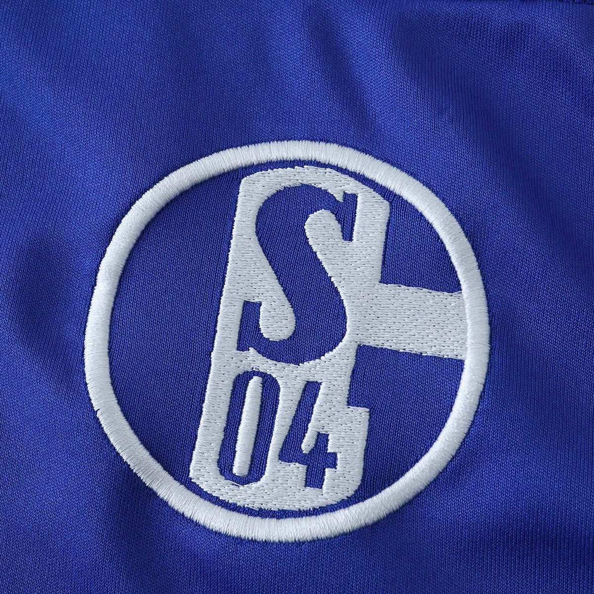 Elite Retro Kits FC Schalke 04 2010/11 home shirt featuring a detailed embroidered club crest on royal blue fabric