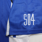 Elite Retro Kits FC Schalke 04 1998 home shirt sleeve detail featuring white S04 embroidery on royal blue fabric