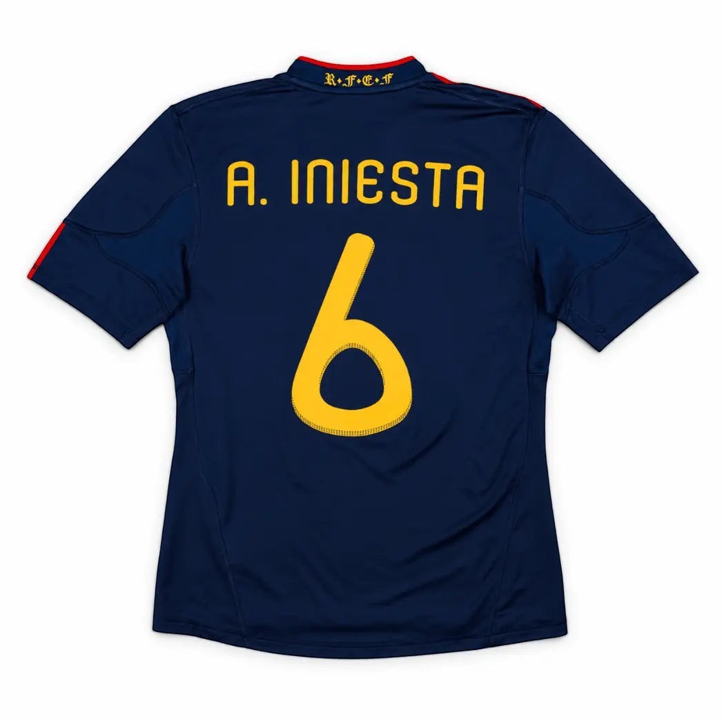 Elite Retro Kits Spain 2010 World Cup final away shirt in navy blue with Iniesta 6 in gold lettering on the back