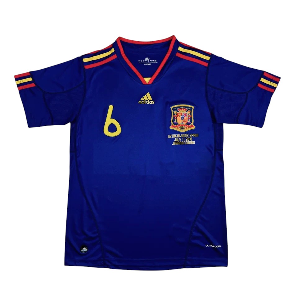 Elite Retro Kits Spain 2010 World Cup final away jersey in navy blue with gold detailing and commemorative embroidery
