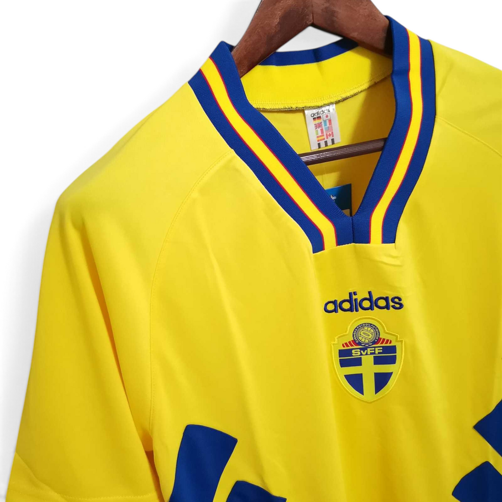 Elite Retro Kits Sweden 1994 home football shirt in yellow with blue and red v-neck trim and team crest