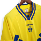 Elite Retro Kits Sweden 1994 home football shirt in yellow with blue and red v-neck trim and team crest