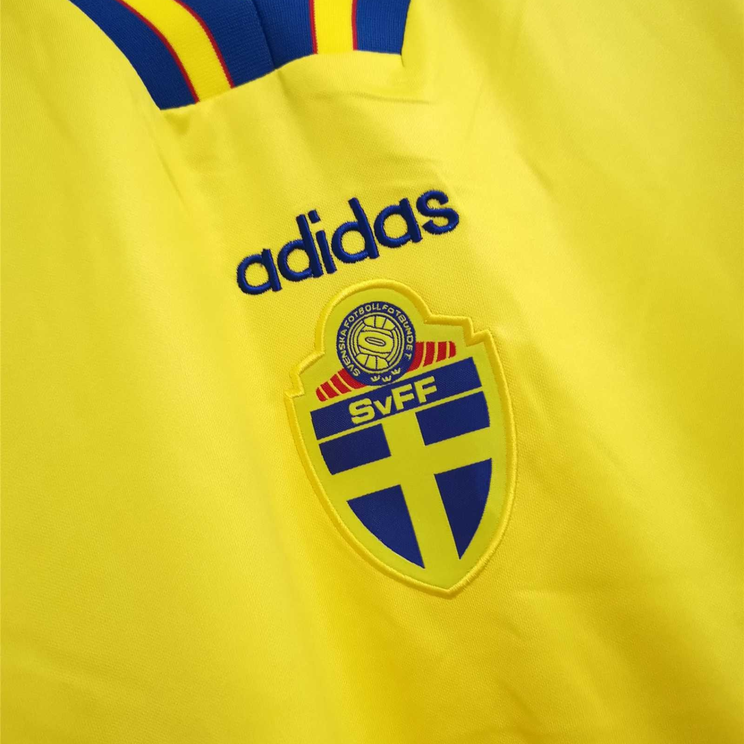 Elite Retro Kits Sweden 1994 home football shirt in yellow with blue trim and the SvFF three crowns crest