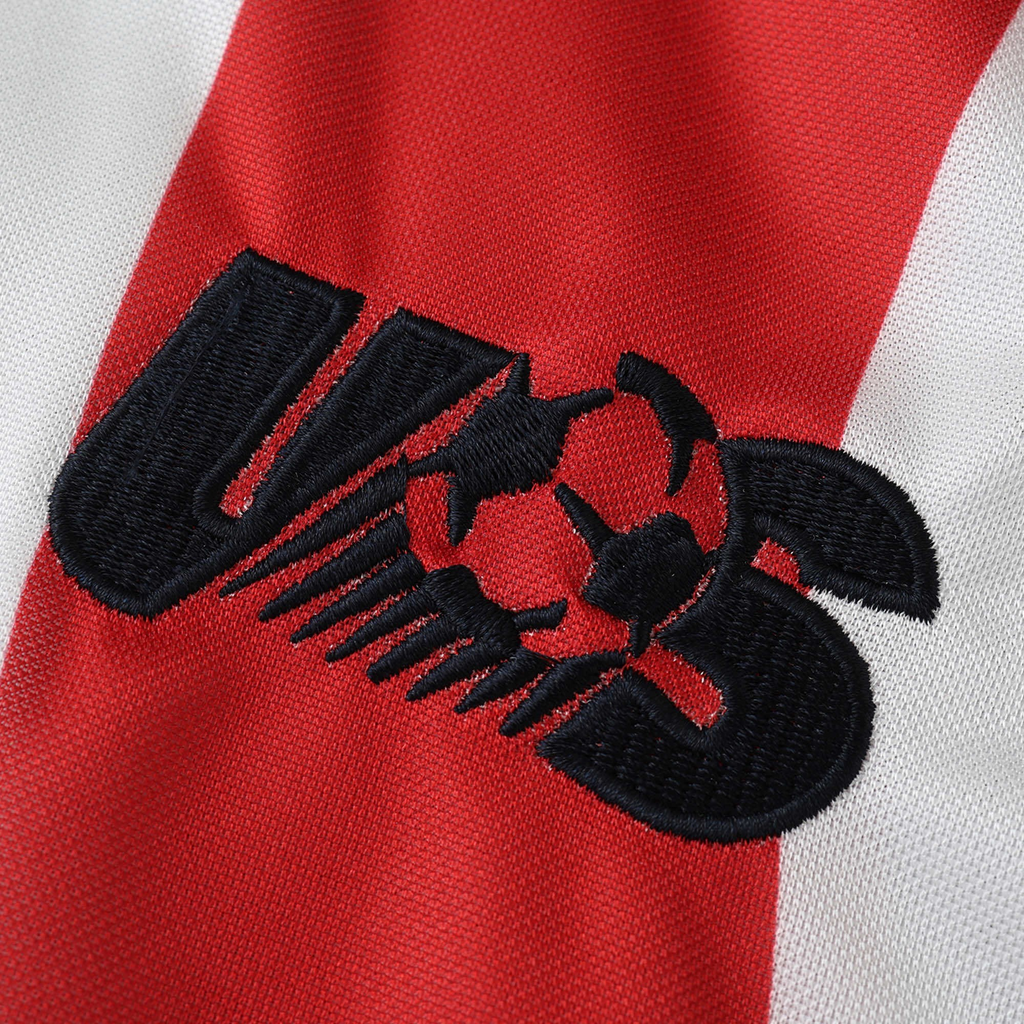 Elite Retro Kits USA 1994 home soccer shirt featuring a detailed embroidered USSF crest on red and white striped fabric
