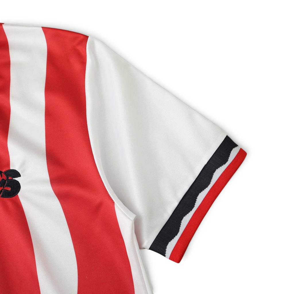 Elite Retro Kits USA 1994 home soccer shirt featuring white and red stripes with a detailed sleeve cuff design.