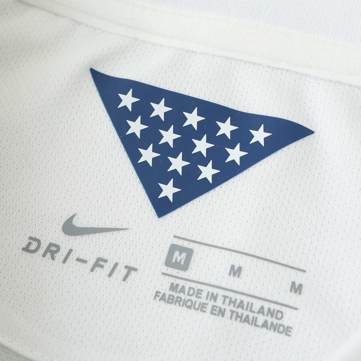 Elite Retro Kits USA 2014 home shirt interior neck label with blue star graphic and Nike Dri-FIT branding