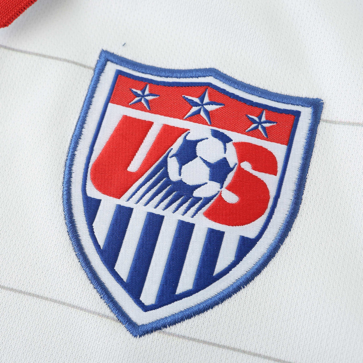 Elite Retro Kits USA 2014 home shirt featuring a detailed embroidered US soccer crest on a white textured fabric