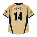Back view of a gold and navy blue soccer jersey with 'HENRY' and the number '14' printed on the back, featuring Premier League patches on the sleeves.