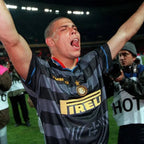 Ronaldo wearing an Inter Milan jersey celebrating on a soccer field with Pirelli logo.