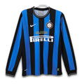 A soccer jersey with blue and black vertical stripes, featuring the Adidas logo, the Inter Milan crest, and the Bwin sponsor name.