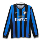 A soccer jersey with blue and black vertical stripes, featuring the Adidas logo, the Inter Milan crest, and the Bwin sponsor name.
