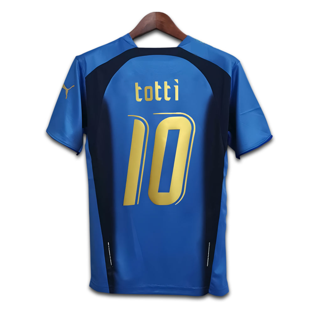 Blue sports jersey with 'totti' and number '10' on a white background