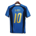 Blue sports jersey with 'totti' and number '10' on a white background