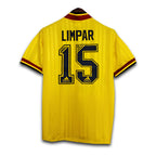 Yellow Arsenal shirt with JVC Adidas sponsoring and Blue stripes and 'LIMPAR' and number '15' on a white background