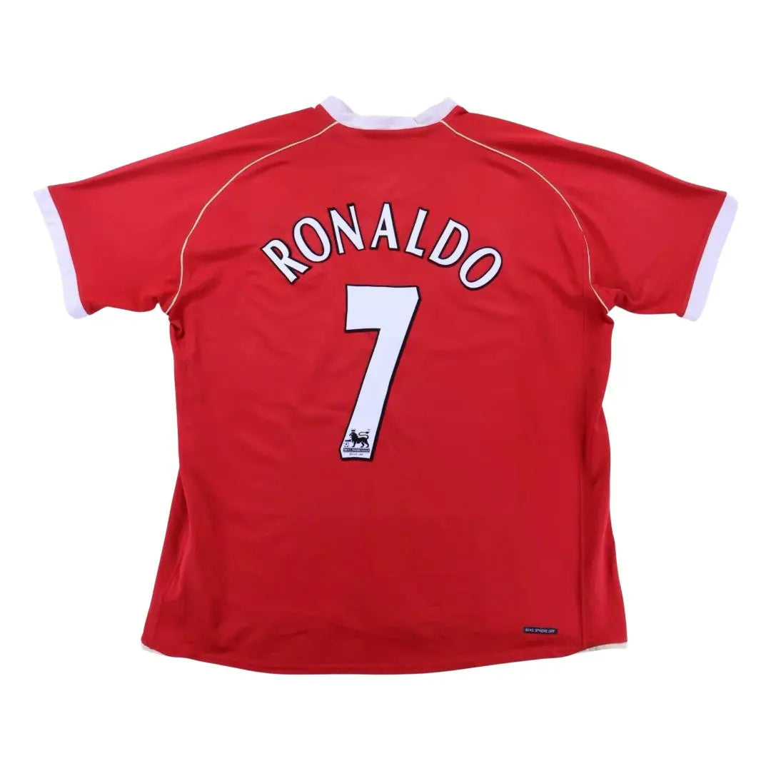A red short-sleeve soccer jersey shown from the back, featuring 'RONALDO' and the number '7' in white with black outlines. The jersey has white trim on the collar and sleeve cuffs, and a small black sponsor logo near the bottom right.