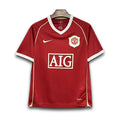 Manchester United retro AIG shirt from the 2006/07 season where legends of the game like Cristiano Ronaldo, displayed his excellence in Manchester Red.
