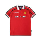 Red sports jersey with branding on a white background