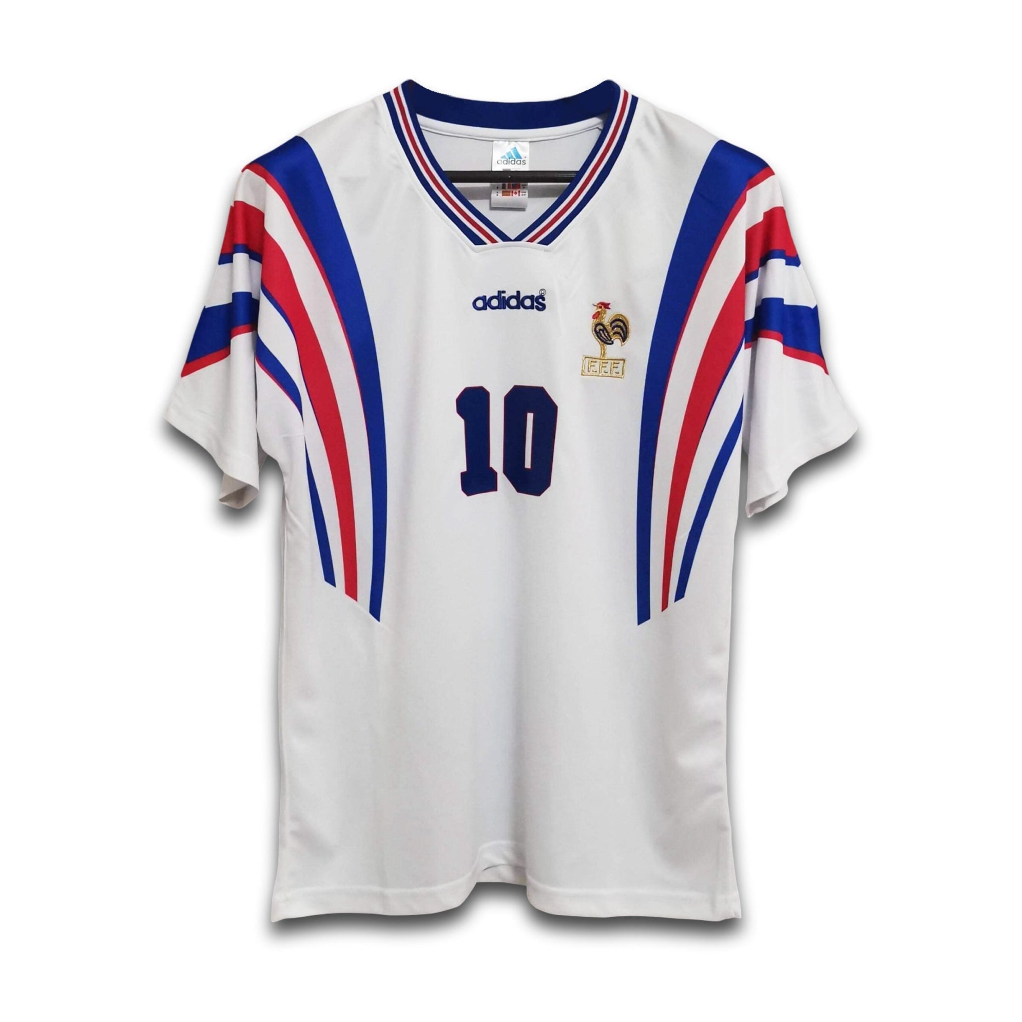 A white football jersey with blue and red accents and the number 10 visible on the front.