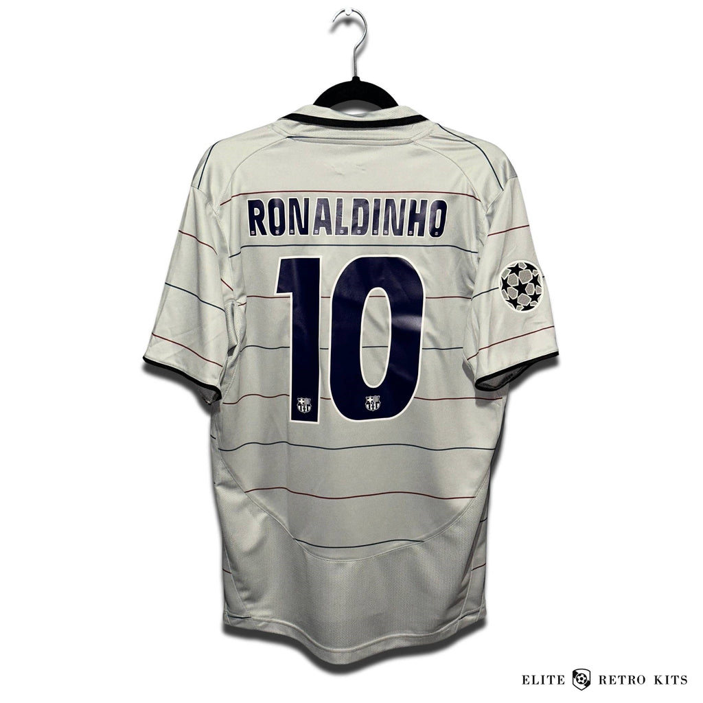 Ronaldinho 10 on the back of the Gray Barcelona away shirt from the early 2000s