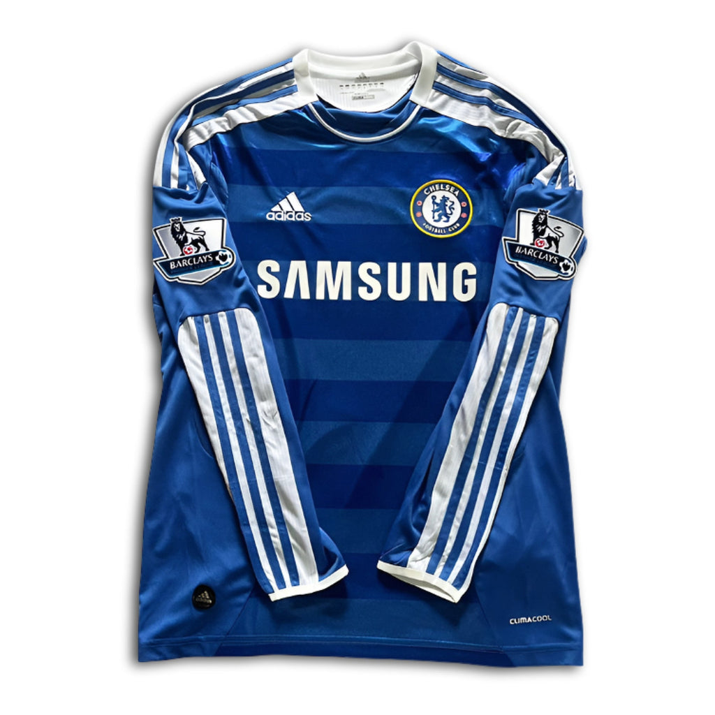 Blue chelsea jersey with white stripes and branding on a white background