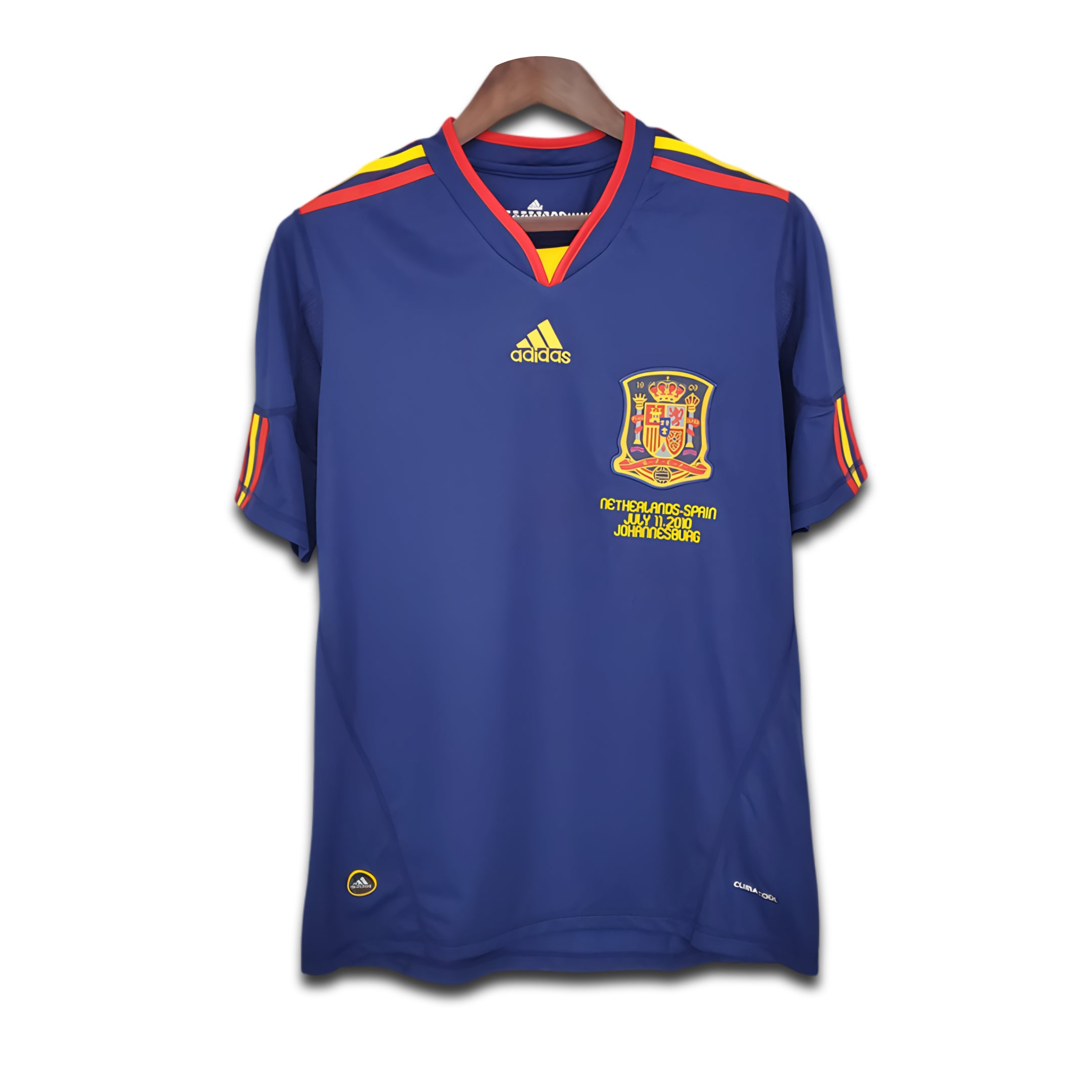Blue sports jersey with Adidas logo and Spanish emblem on a white background